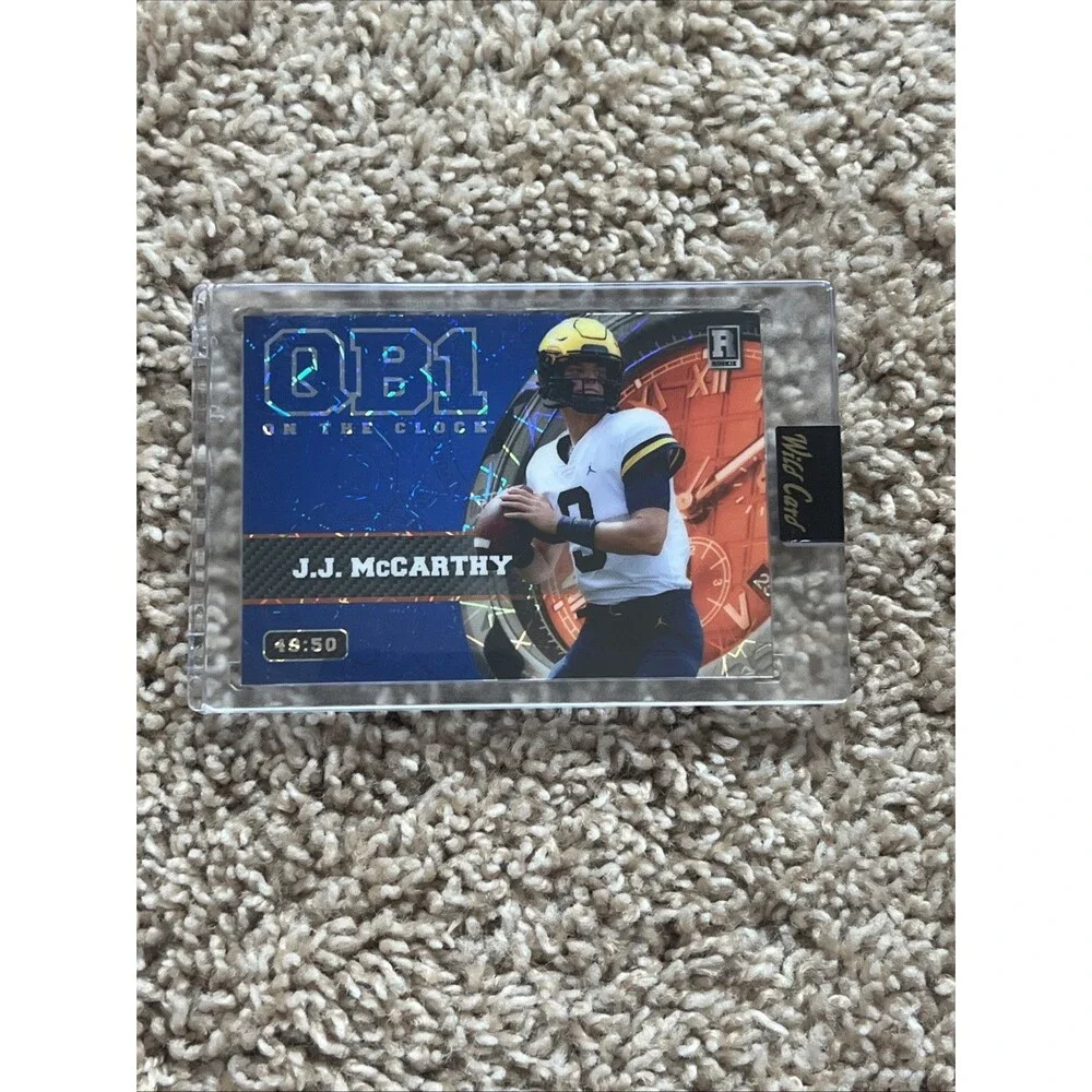J.J. McCarthy 2023 Wild Card QB1 On The Clock Rookie Card 49/50